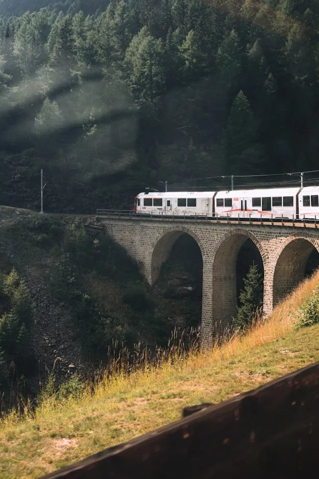 Train crossing a mountain viaduct